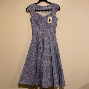 Long, blue pattern dress with sweetheart neckline